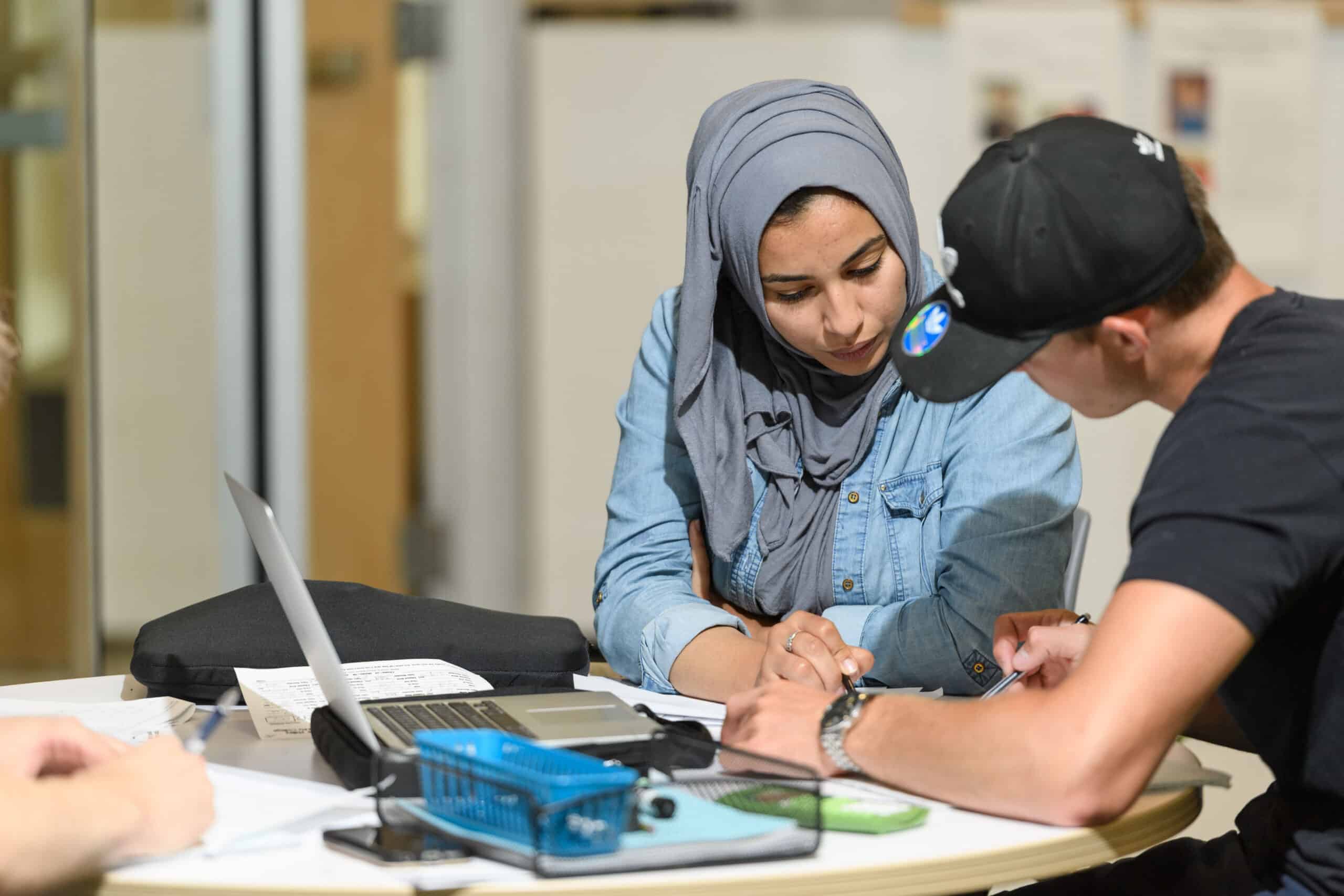 two students looking over homework