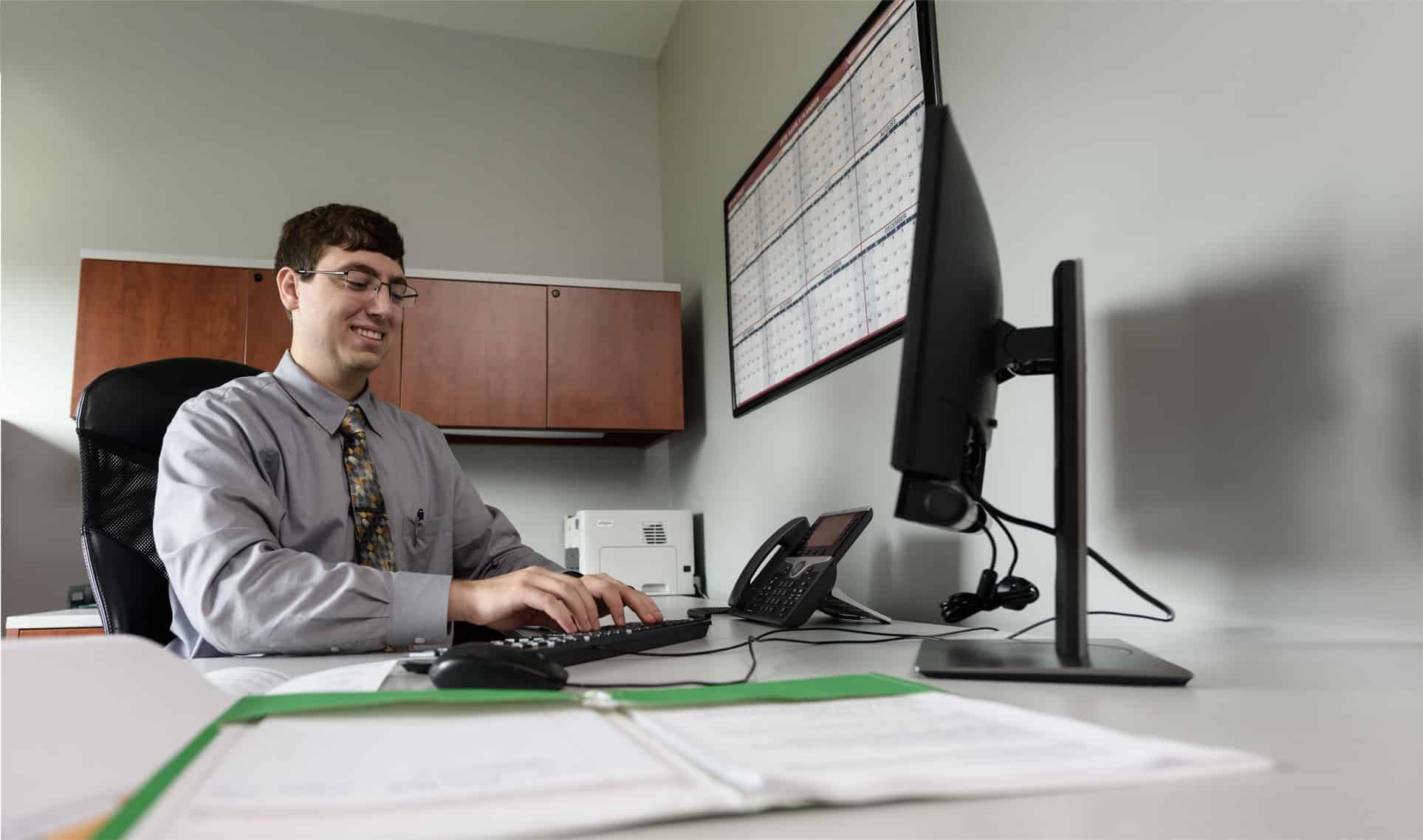 Student sitting in front of computer
