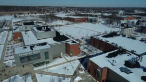 Aerial view of Moraine Valley campus in winter with snow.