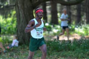 A cross country runner focuses during a race