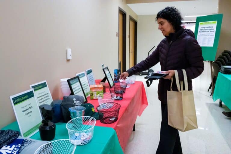An employee selects a prize awarded from employee giving.
