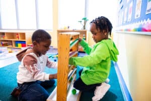 Two kids playing at the Children's Learning Center