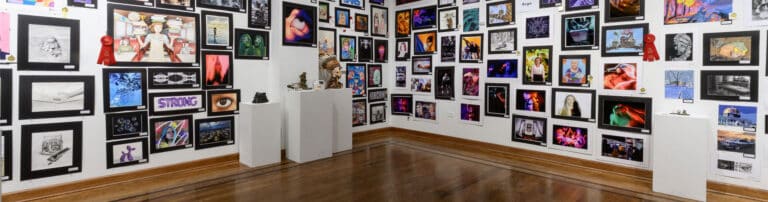 Art gallery with photos and paintings