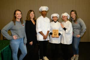 High school students competed at Moraine Valley Community College’s annual High School Pastry Decorating Competition in October. The winning team was Eisenhower High School (from left)