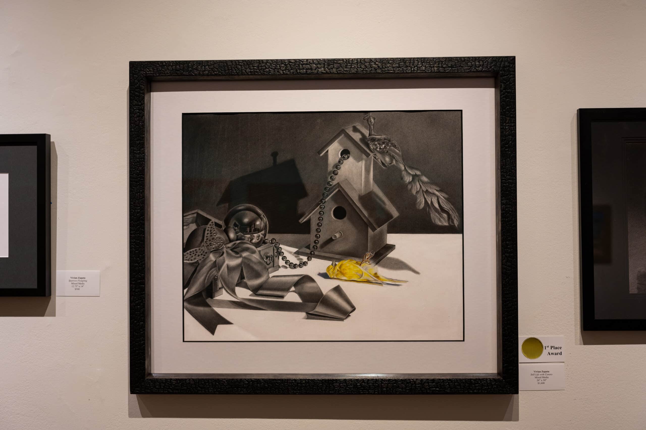 First place in the Moraine Valley Community College Juried Community Art Exhibition is “Still Life With Canary” by Vivian Zapata.