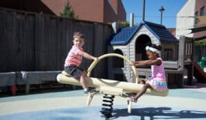 Two children on playground.