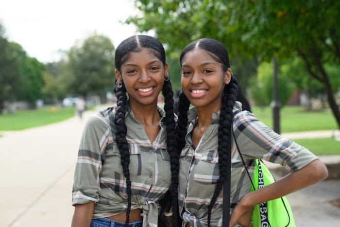 Two girls smiling